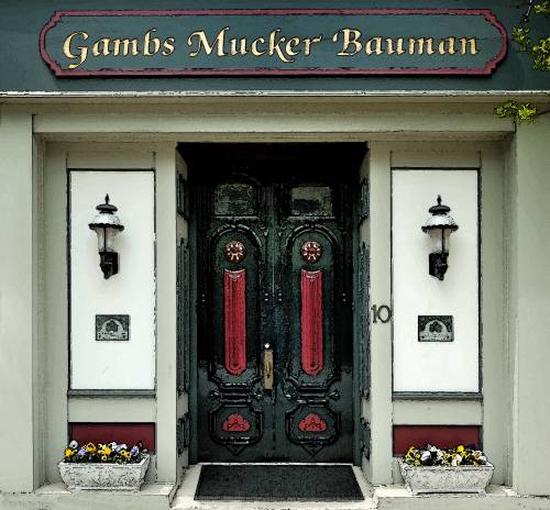 Photo of the Gambs Mucker Bauman sign on office building